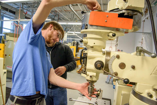 students using machinery