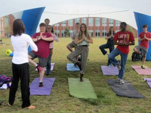 Fresh check students do yoga