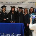 nursing students pose with instructors